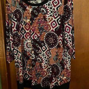 Cranberry and black shirt with a solid black hem